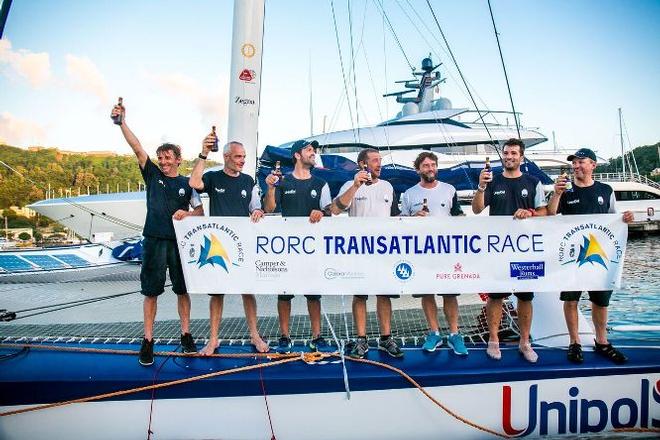 Giovanni Soldini and team celebrate finishing the RORC Transatlantic Race © RORC/Arthur Daniel